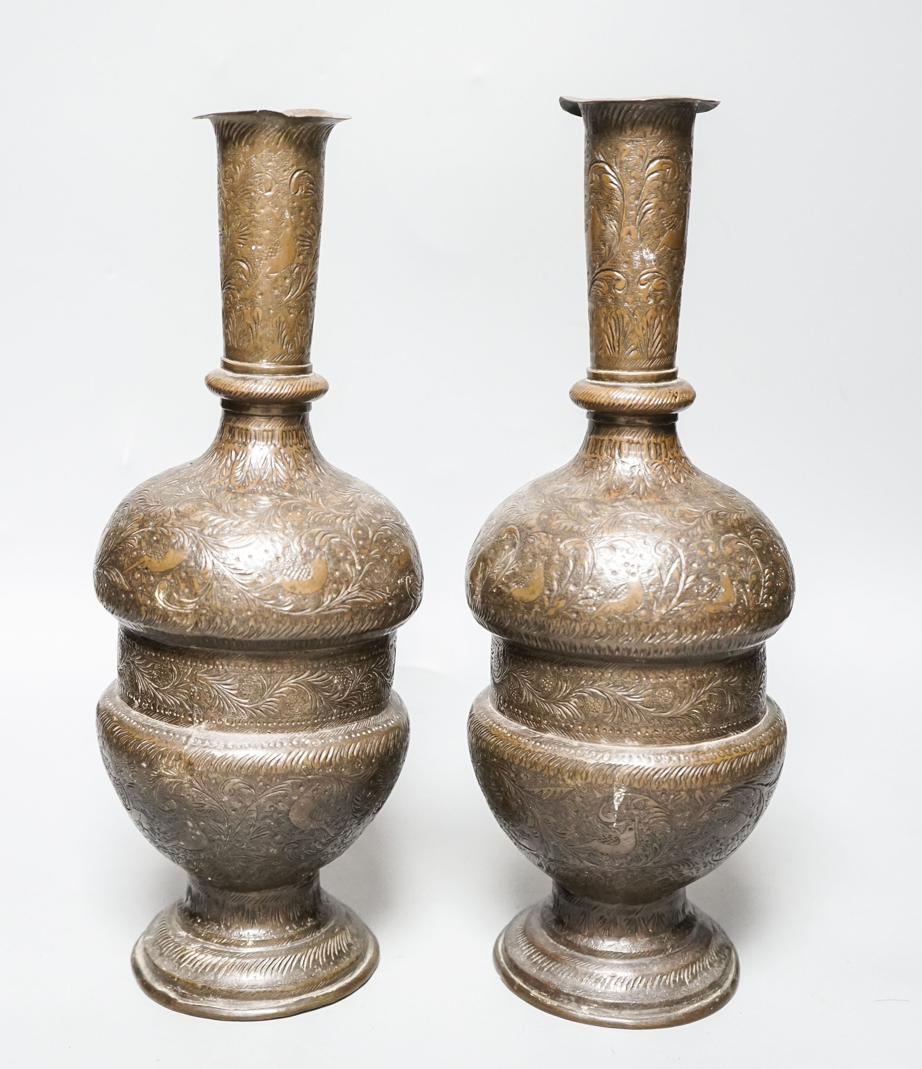 A pair of Persian engraved vases 32cm
